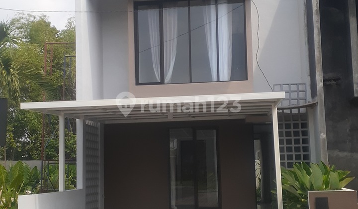 Rumah 2 Lantai Desain Minimalis Sederhan Di Gedangan Sidoarjo.