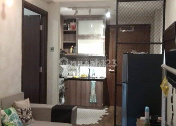 ruang tamu sewa apartemen 1br siap huni