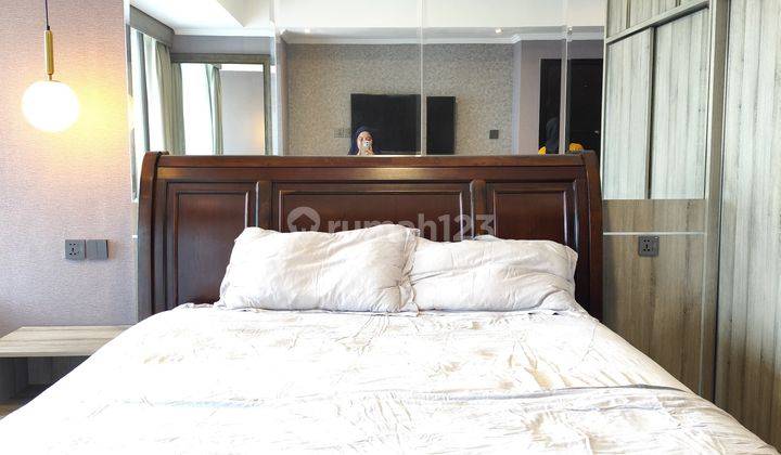 kamar tidur sewa apartemen studio siap huni