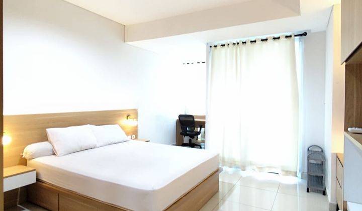 kamar tidur sewa apartemen studio full furnished