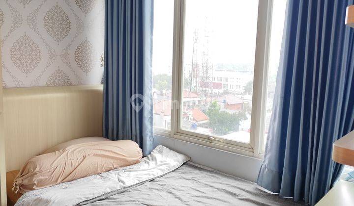 kamar tidur sewa apartemen 2br lokasi strategis