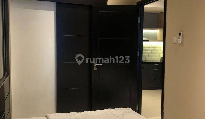 kamar tidur sewa apartemen 2br free shuttle