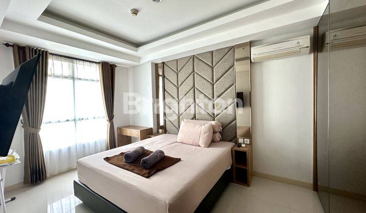 Apartemen 2BR View Swimming Pool 1