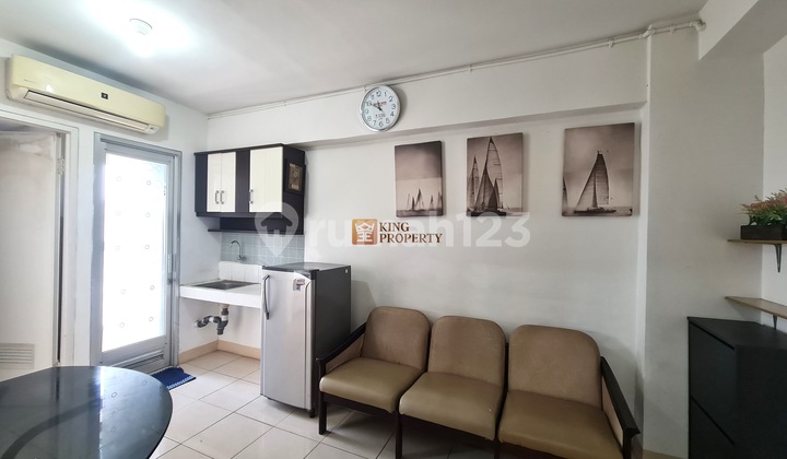 For Sale: Green Bay Pluit Apartment, North Jakarta, Coastview Tower. Strategic location near mall, easy drop access, favorite pool view. Furnished with items including bonus sofa, AC, kitchen set, refrigerator, wardrobe, LCD TV (total 64 local and international channels).