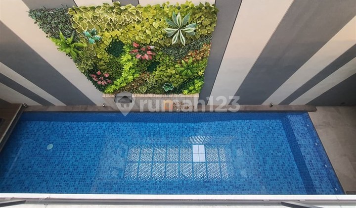 Private Pool! Dijual Rumah Mewah Modern Luxury Puri Mansion, Dekat Puri Indah Mall & RSPI, Fasilitas One Gate System, Private Club House, Kolam renang, Playground anak, Lapangan basket / multi-purpose court, Gym & fitness center