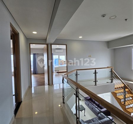 Near Puri Indah Mall & Siloam Hospital, 2nd Floor Unit for Rent Semi-Furnished at Maqna Residence, Strategically Located in a Business Park Environment with Indoor Swimming Pool, Sky Terrace, Fitness Center Facilities.
