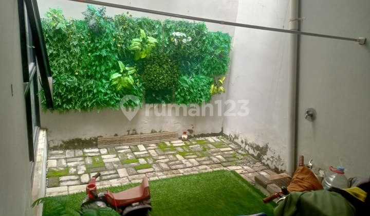 Dekat Akses Tol, Rumah, 2 Lantai, SHM di Grand Wisata 2