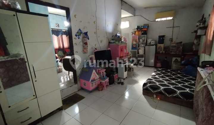 Rumah Posisi Hook dengan Tanah Lebih bisa untuk Lahan Parkir Dll 2