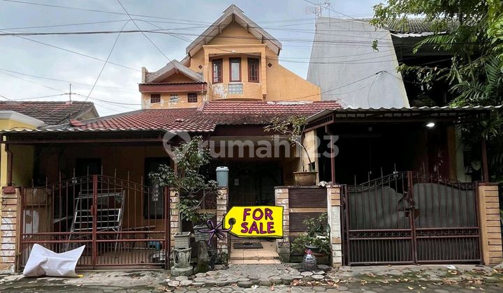 tampak depan jual cepat rumah wisma permai