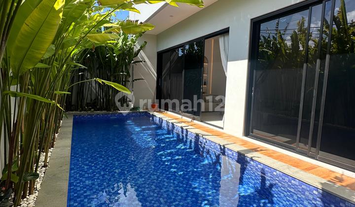 Rumah Modern Tropis dengan Rooftop Jimbaran Bali