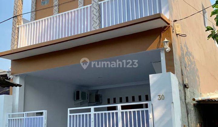 Dijual Rumah Kost di Jl. Idris. Rawabelong 2