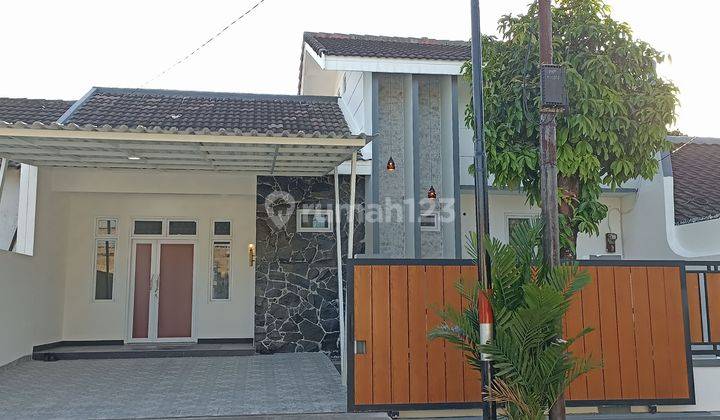 Rumah Artistik Asri di Lingkungan Tenang dan Strategis 2