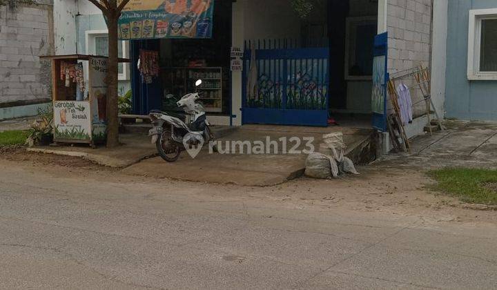 Rumah siap huni di lengkap kios dgn rolling door lipat  1