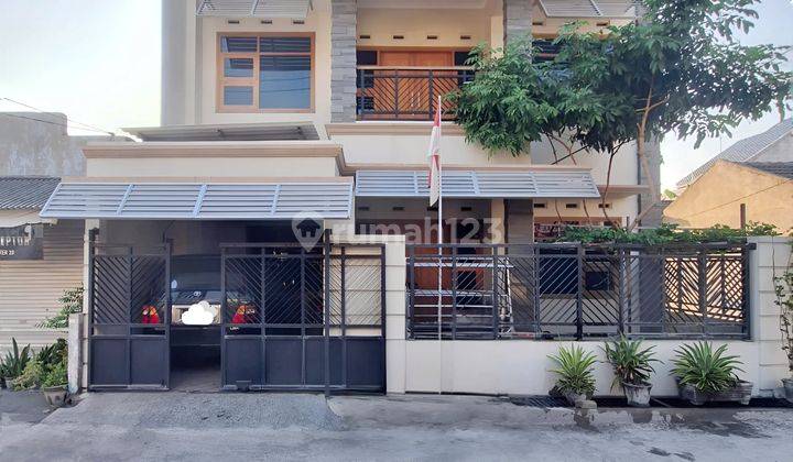 Dijual Rumah 2 Lantai SHM di Perumahan Griya Kencana, Hadap Barat 1