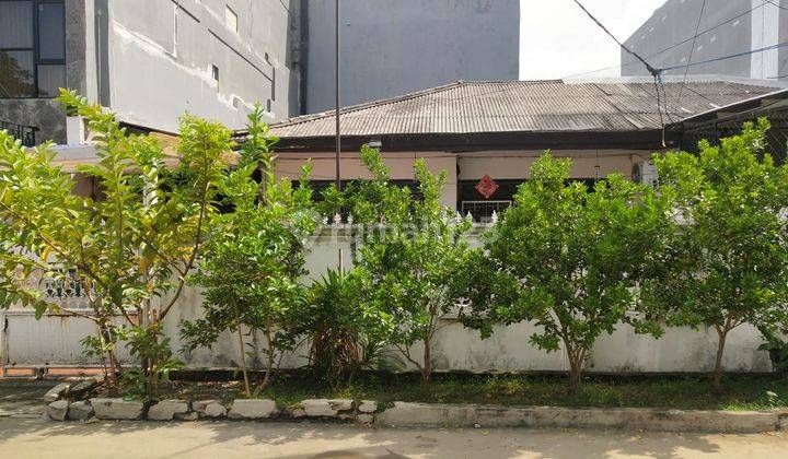 Rumah Tua di Pluit Putri 10x22 Hadap Utara 1