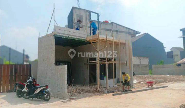 Rumah 2 Lantai Samping Jalan Cipayung Jakarta Timur Bebas Banjir 1