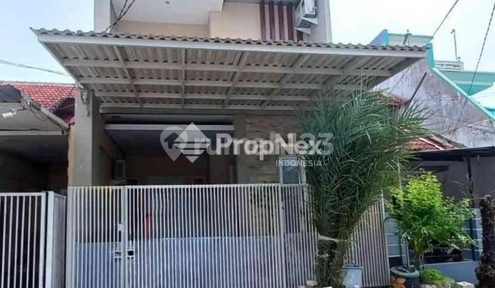 Rumah Minimalis Taman Pondok Indah Surabaya Barat