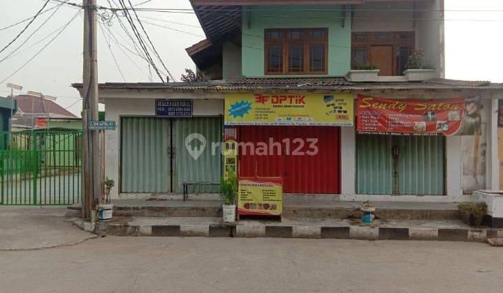 Rumah 2 lantai +kios bisa usaha di Pejuang jaya 1