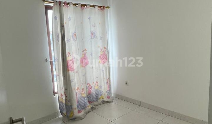 For rent, 2-story semi-furnished house in Jakarta Garden City cluster, front-facing. 2