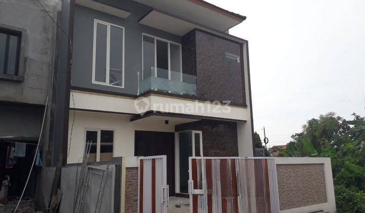 Rumah Rungkut Asri Tengah New Modern Minimalis  1