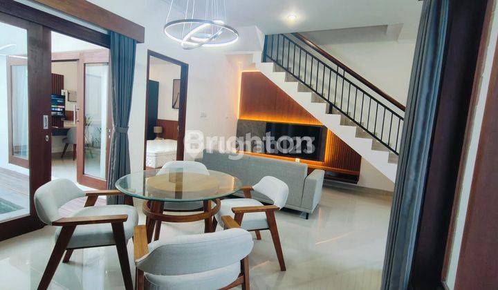 Hunian nyaman di kawasan elite MUMBUL-NUSA DUA Desain bangunan 2 lantai dengan konsep  Modern Minimalist. 2