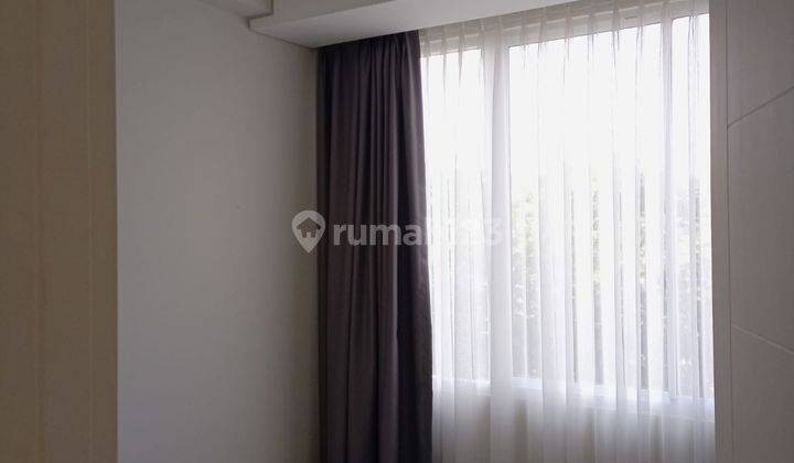 Apartement Siap Huni Semi Furnish View Danau di Rainbow Springs 2