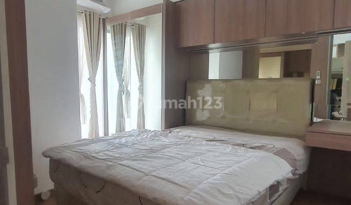 Apartemen Mid Town, Gading Serpong, Sebrang Mall SMS. Jarang Ditempati, View Kolam Renang, Full Furnished, IPL Murah.  2