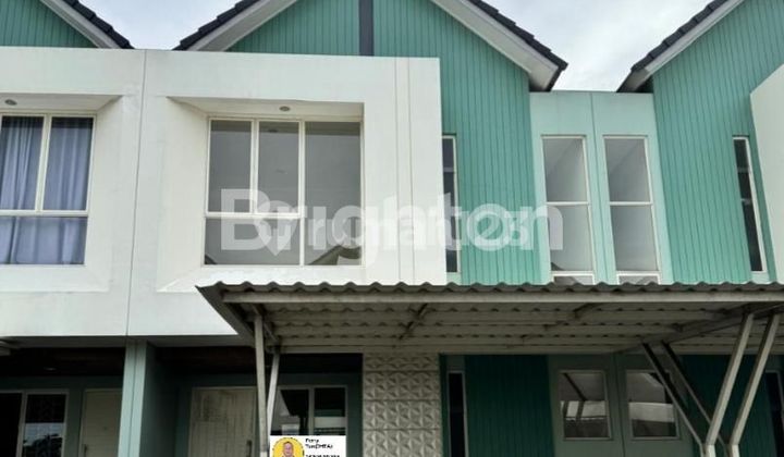 A beautiful two-story residence in Suvarna Cikupa, Tangerang. The location is very strategic, near the sports club. 1