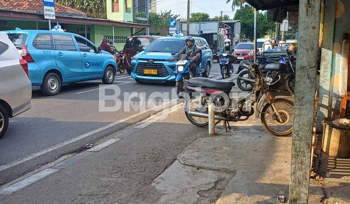 Tanah berisi Kontrakan dipinggir Jalan Raya 1