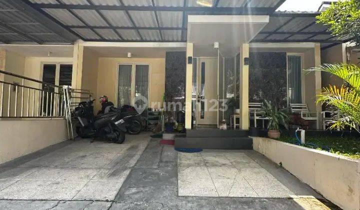 Rumah Semi Furnished di Taman Puspa Raya Citraland Utama 2