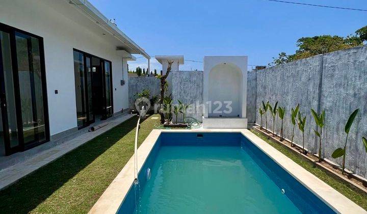 New Unfurnished 2 Bedroom Villa In Umalas With A Fully Enclosed Kitchen living Room For Longterm Rental 1