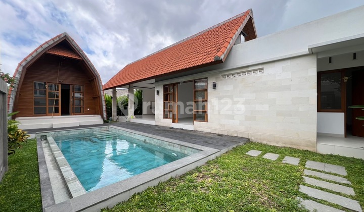 Brand new unfurnished 2 bedroom villa with potential extra office space, situated on a generous plot of land in Padonan.