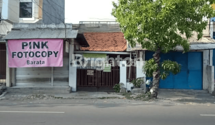 RUMAH BARATA JAYA PINGGIR JALAN RAYA 1