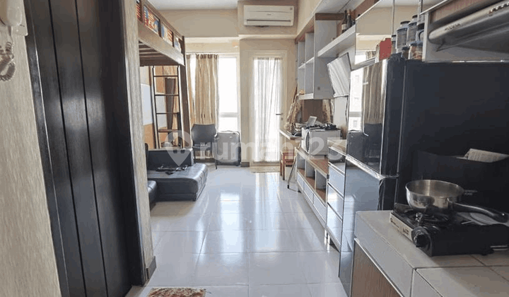 Ready-to-Occupy Gading Serpong Apartment in a Strategic Location