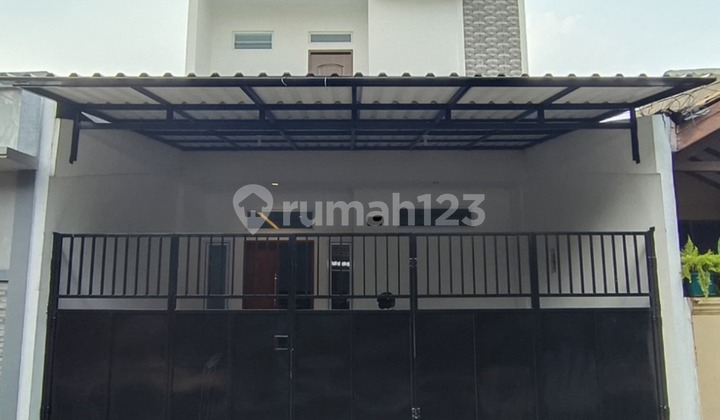 Rumah 2 1/2 Lantai Siap Huni