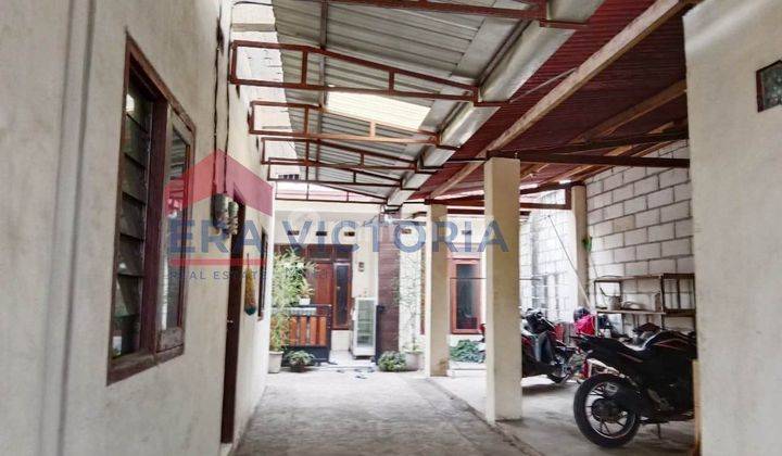 Dijual Rumah Tepi Jalan Besar Strategis Dengan Supermarket 2