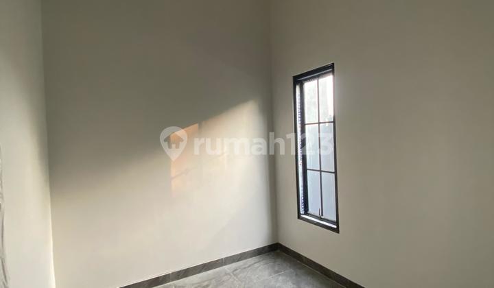 Modern Minimalist 2-Story House Near Bedahan Swangan Road, Depok 2