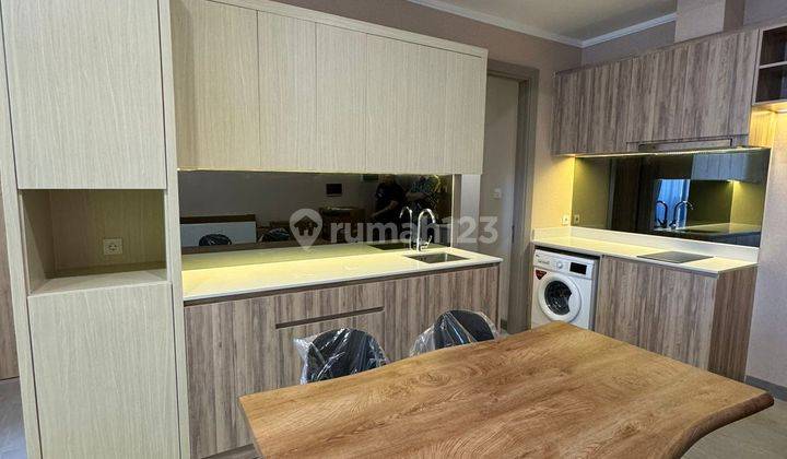 Apartement Menara Jakarta 2 BR Semi Furnished Baru 1