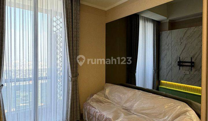 Apartement Menara Jakarta 2 BR Semi Furnished Baru 2