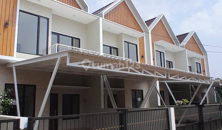 Rumah 2 Lantai Mewah Strategis Free Canopy Free Pagar Free Biaya 1