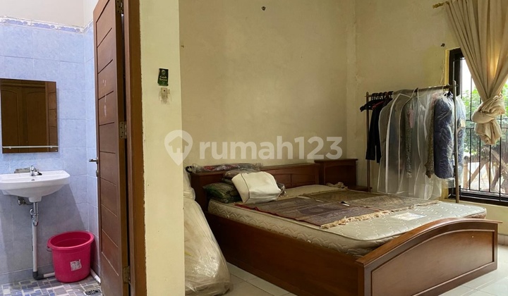 Beautiful 2-Story House, Well-Maintained and Ready to Occupy with 2 Boarding Units on Cililitan Besar Main Road