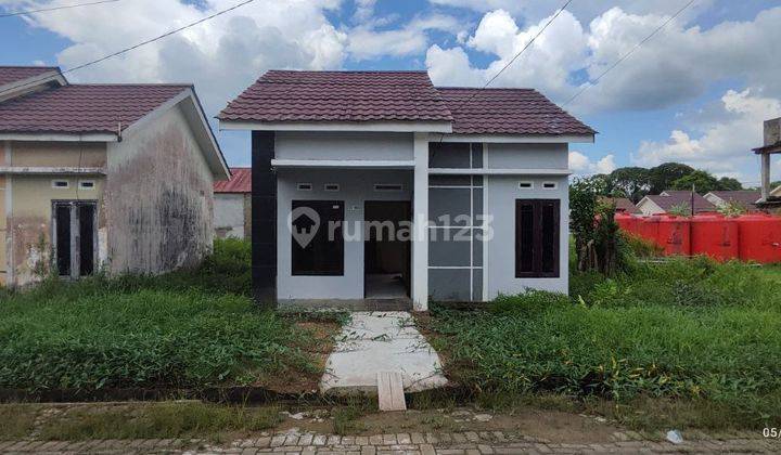 Rumah Minimalis di Pinngiran Kota Area Berkembang 1