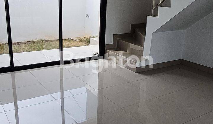 RUMAH MINIMALIS DENGAN MEZANINE HARGA TERJANGKAU 2