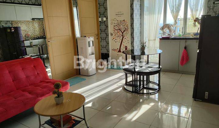 apartemen full furnish educity 2KT hadap kolam angsa 1