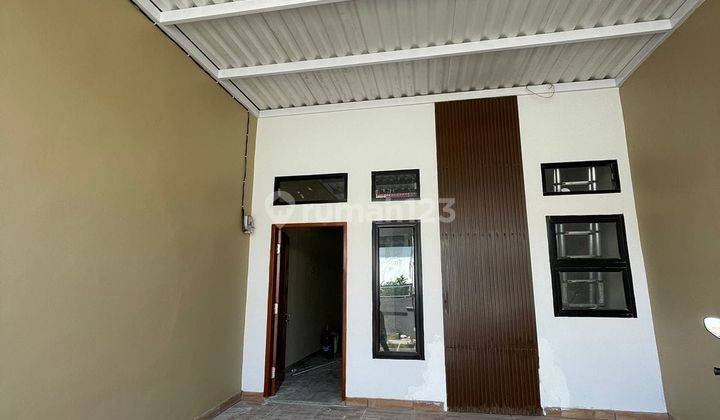 RUMAH BARU 2 LT SIAP HUNI,SHM,LUAS TANAH 66 M,LUAS BANGUNAN 66 M,KAMAR TIDUR 3,KAMAR MANDI 2,LISTRIK 1300 RUMAH HADAP JALAN RAYA DI HARAPAN INDAH 1 BEKASI 2