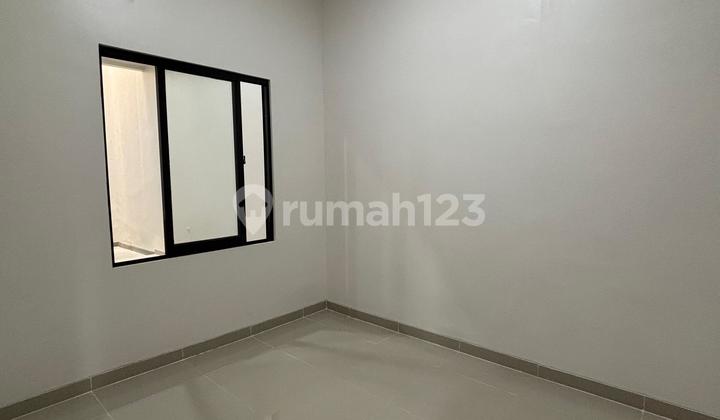 2-Story House with Front Balcony, Already Roofed in Villa Melati Mas 2