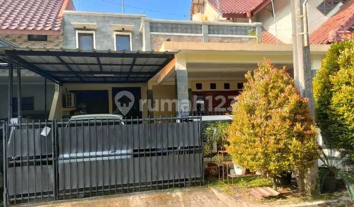 For Sale 1.5-Story House in a Comfortable, Quiet, and Green Complex in Megapolitan Cinere Estate 1