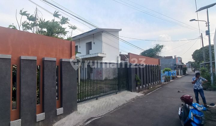 Jual Tanah Bonus Bangunan 8 Kamar Kos 80% Jadi