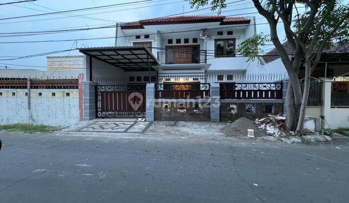 Dijual Rumah 2 Lantai Babatan Pantai SHM Strategis Akses Jalan 2