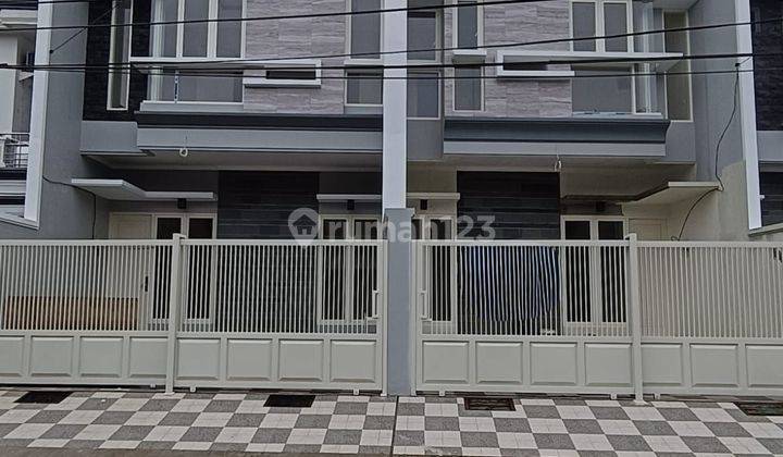 Rumah baru  dengan konsep minimalis modern Nginden intan Surabaya ,surat ShM 1